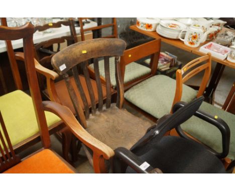 An elm seated slat back chair and an oak ladder back chair