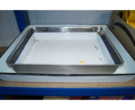 One stainless steel and two enamel dishes
