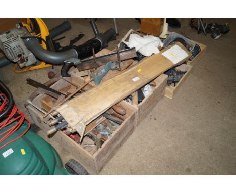 Four boxes containing various tools to include Bosch drill; spanners; clamps etc