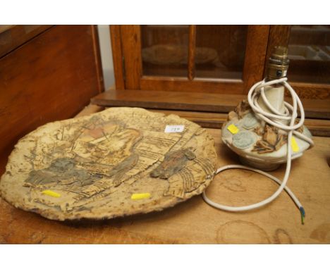 A Bernard Rooke pottery table lamp and a Bernard Rooke pottery wall plaque decorated with musicians