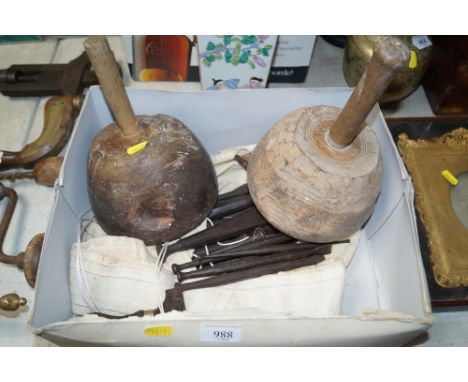 A box of tools to include mallets and various chisels