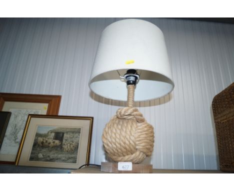 A nautical rope decorated table lamp