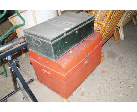 A red metal trunk and ammunition box