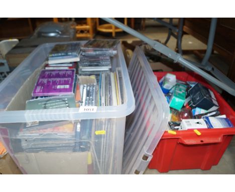 A box of records, CD's and a box of light bulbs