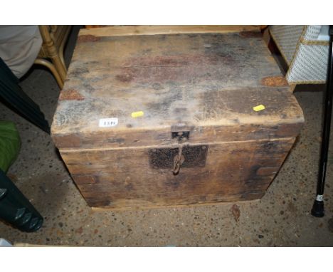 A wooden chest and contents of tools to include planes, levels, blow lamp, bottles, etc.