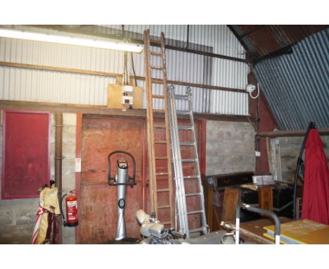 A wooden extending ladder
