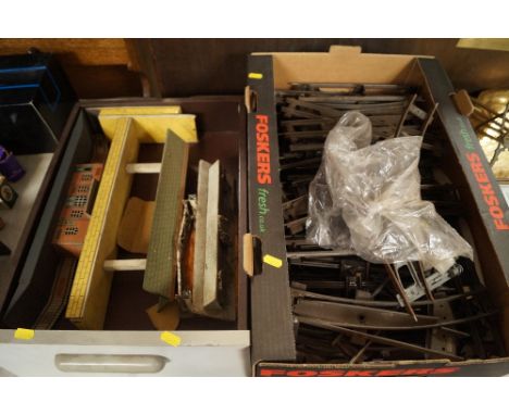 Two boxes of tin plate model railway items