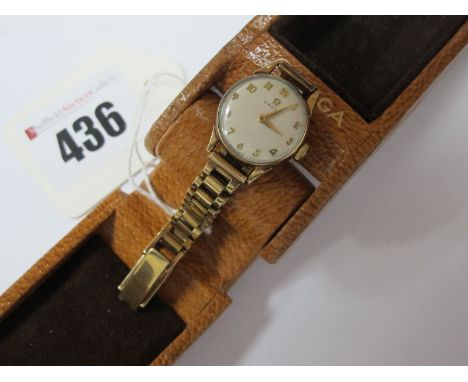 Omega; A Vintage 9ct Gold Cased Ladies Wristwatch, the signed dial with Arabic numerals, within plain case, to a bracelet wit