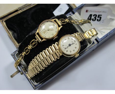 A Vintage Ladies Wristwatch, the case back stamped "18K 0.750", on an openwork bracelet; together with a 9ct gold cased ladie