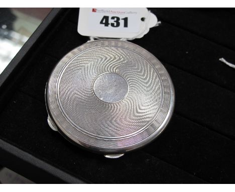 A Hallmarked Silver Powder Compact, VB, Birmingham 1921, of circular form, allover engine turned, 6.5cm diameter.