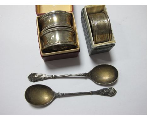 A Pair of Hallmarked Silver Teaspoons, together with a pair of hallmarked silver napkin rings and another hallmarked silver n