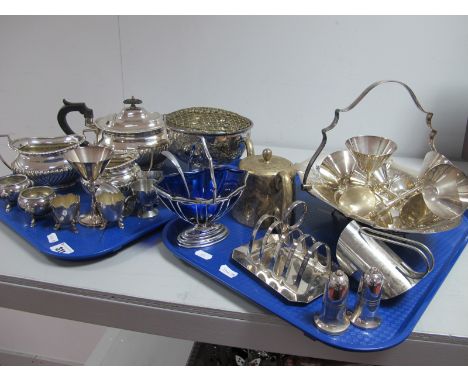 A Mappin &amp; Webb Plated Three Piece Tea Set, a plated swing handled dish, set of goblets, a toast rack, a modern swing han