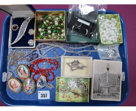 An Openwork Set Bar Brooch, stamped "9ct"; Limoges ceramic panel brooches, bead necklaces, pendants on chains, etc:- One Tray