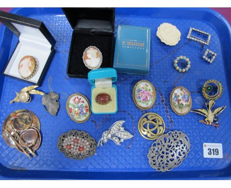 A Collection of Assorted Costume Brooches, including oval shell carved cameo, Limoges ceramic panel, Celtic style, etc:- One 