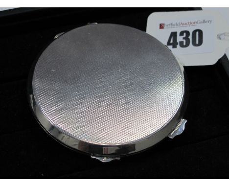 A Hallmarked Silver Powder Compact, A Bros Ltd, Birmingham 1954, of circular for, allover engine turned, 7.8cm diameter.