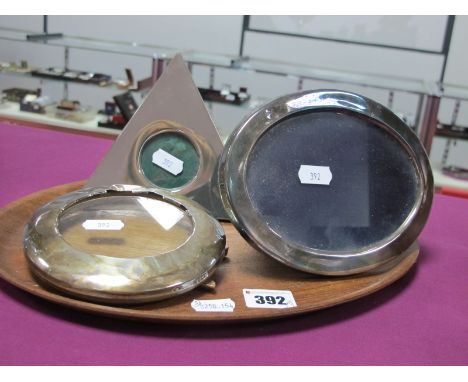 A Modern Hallmarked Silver Mounted Oval Photograph Frame,  HH, Sheffield 1981, on navy blue plush easel back, overall width 1