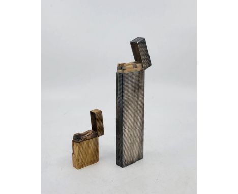 A large vintage S.T.Dupont silver plated table lighter, with diamond point texture, height 14cm, together with an S.T.Dupont 