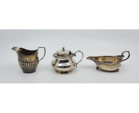 A William IV silver baluster form mustard, by Richard Pearce and George Burrows, London 1831, with shell thumb grip and acant