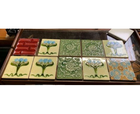 A Mintons tile in the aesthetic style, together with other tiles