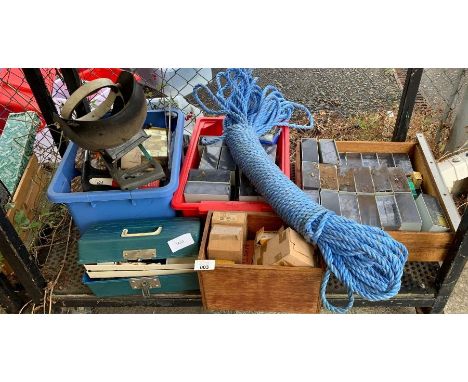 Shelf of items to include a large bundle of blue rope, tool box, plastic containers of screws, washers, tower clips etc