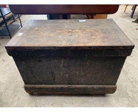 Black painted wooden trunk on later casters