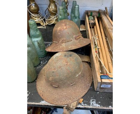 2 military helmets, possibly French, along with a tantalus, weather vane etc ## pat tested ##