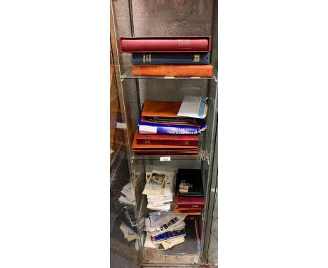 3 shelves of stamps of first day covers