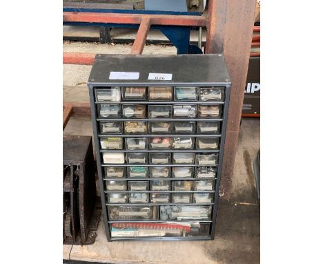 Metal set of drawers with various contents to include tools, screws, etc