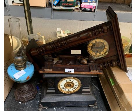 Slate mantel clock, a wall clock and an oil lamp