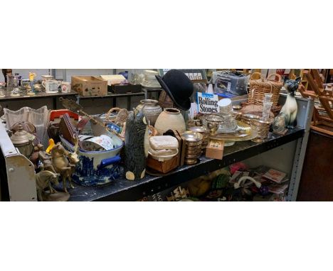 Shelf containing wicker baskets, ship in a bottle, plated dishes, blue &amp; white pot, brass ornaments, bowler hat etc