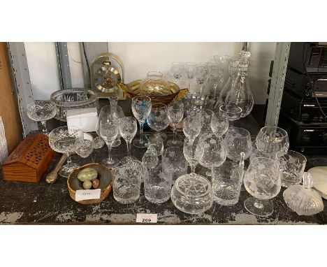 Shelf of cut glass, etched glass, decanter, jug, bowls &amp; clock