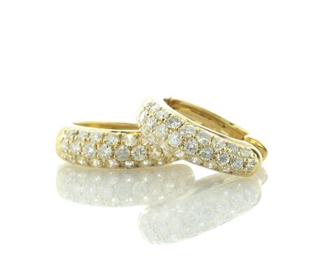 These charming 14ct yellow gold hoop earrings have multiple round brilliant cut diamonds along the front half of the hoop in 