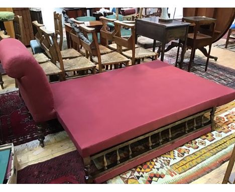 An unusual Victorian stained beech fold out chaise longue daybed with scroll button ends and fold out gallery rail back, rais