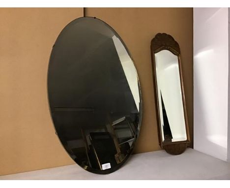 An oval bevelled glass wall mirror (75cm x 51cm) and another in wooden frame (2)