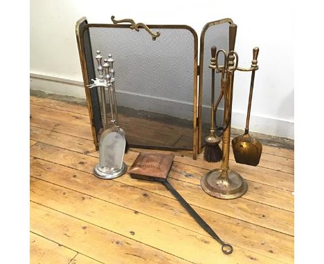 An Edwardian copper chestnut roaster with perforated lid (60cm x 22cm), a companion set with tongs, shovel, brush and poker a