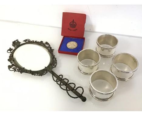 A set of four Villeroy &amp; Boch napkin rings with foliate edges, in original boxes, a King George V and Queen Mary commemor