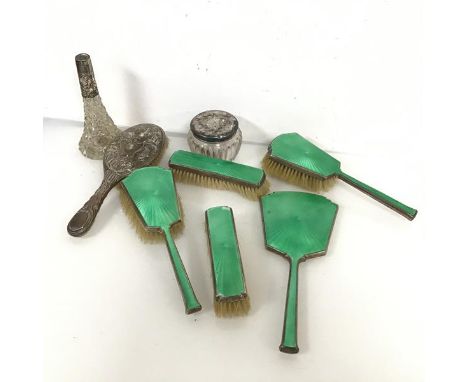 A 1930s Birmingham silver guilloche dressing table set including mirror (28cm), two hairbrushes and two clothes brushes toget