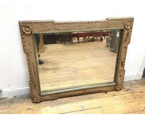 A 1920s/30s bevelled glass wall mirror within moulded and painted frame (100cm x 78cm)