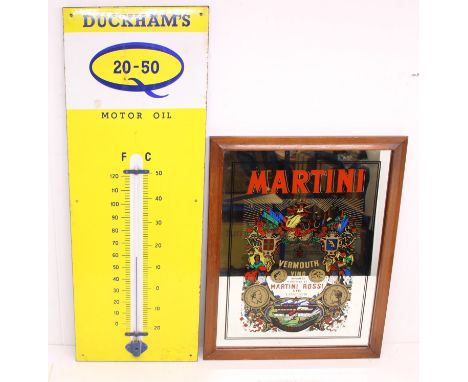 Advertising: A Duckham's Motor Oil, yellow and white enamel advertising sign, with large thermometer. Six screwholes to front