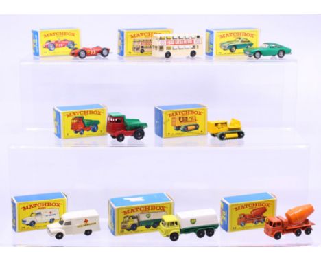 Matchbox: A collection of eight assorted boxed Matchbox 75 Series vehicles to comprise: Ferrari Racing Car 73, Daimler Bus 74