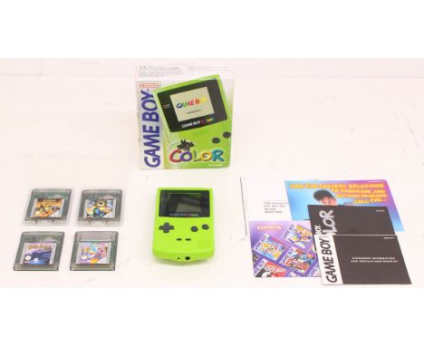 Game Boy: An original boxed Nintendo, Game Boy Color handheld console, Reference CGB-001. Together with four Game Boy unboxed