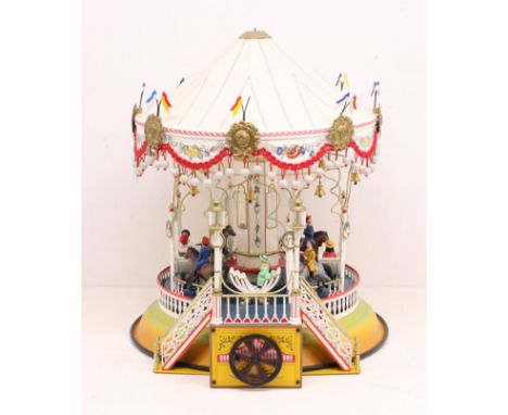 Marklin: A boxed Marklin Carousel, Reference 16121. 'Reproduction of the former 8847 Marklin carrousel from the start of the 