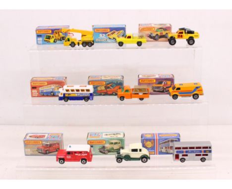 Matchbox: A collection of eight assorted boxed Matchbox 75 Series vehicles to comprise: Crane Truck 49, Wild Life Truck 57, 4