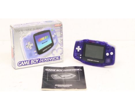 Game Boy: A boxed Nintendo Game Boy Advance console, transparent purple console with instruction booklet; and a collection of