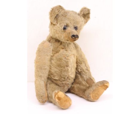 Steiff: An early 20th century, mohair teddy bear, believed to be Steiff, circa 1910. Button eyes, stitched nose and pads, hum