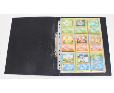 Pokemon: A collection of assorted Pokemon cards, contained within one folder to include: Wizards of the Coast examples from B