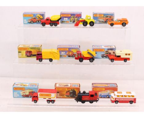 Matchbox: A collection of nine assorted boxed Matchbox 75 Series vehicles to comprise: Cement Truck 19, Tractor Shovel 29, Va