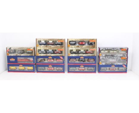 Bachmann: A collection of fourteen assorted boxed Bachmann, OO Gauge rolling stock sets and other rolling stock. General wear