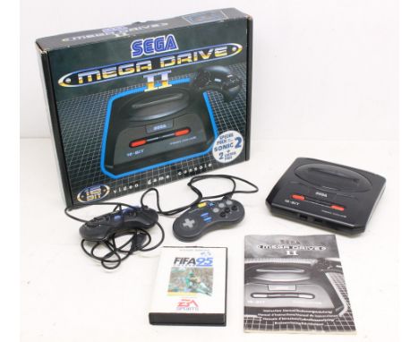 Sega: A boxed Sega Mega Drive II console, with two unofficial controllers, and instruction manual, but no power supply; and a