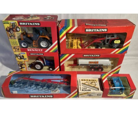 Britains: A collection of assorted Britains farm tractors and implements to include: rare 9516 Ford 6600 Tractor unused, slig